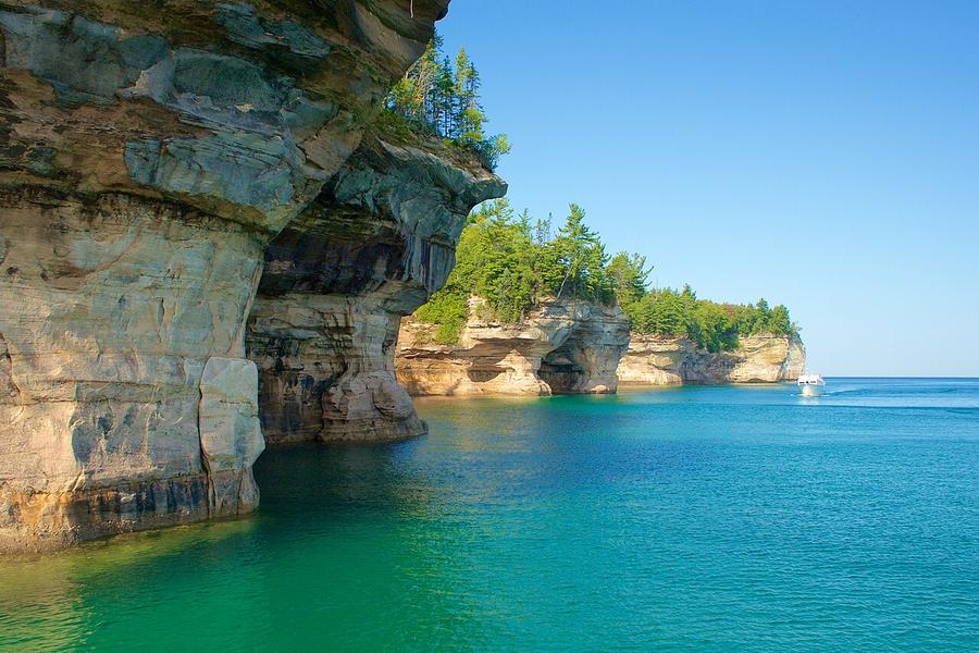 Sandstone cliffs of Pictured Rocks National Lakeshore rising from Lake Superior, Michigan