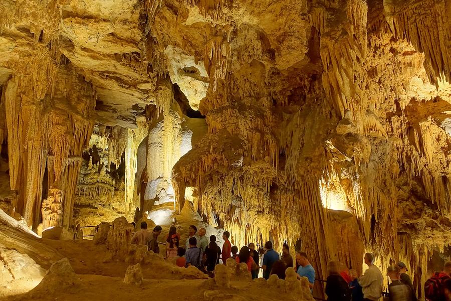 Visitors among stalactites inside Luray Caverns, Virginia